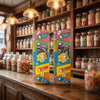 Bebeto Giant Pencils 400g x 2 displayed on a traditional wooden counter in a classic British sweet shop setting