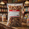 Bebeto Fizzy Cola Bottles 2kg displayed on a traditional wooden counter in a classic British sweet shop setting