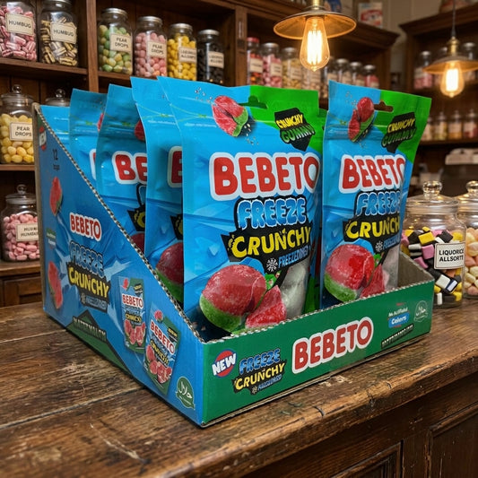 Bebeto Freeze Dried Watermelon Slices 12 x 35g displayed on a traditional wooden counter in a classic British sweet shop setting
