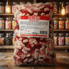 Bebeto Teeth & Lips 2kg displayed on a traditional wooden counter in a classic British sweet shop setting
