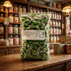 Krazy Kandi Chocolate Limes 3kg displayed on a traditional wooden counter in a classic British sweet shop setting