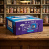 Cadburys Dairy Milk Oreo Sandwich 14 x 96g displayed on a traditional wooden counter in a classic British sweet shop setting