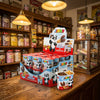 Jimmy The Panda Hazelnut Spread With Cocoa & Breadsticks 24 Pack displayed on a traditional wooden counter in a classic British sweet shop setting