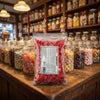 Bebeto Sugared Hearts 2kg displayed on a traditional wooden counter in a classic British sweet shop setting