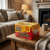 House Of Lancaster Fully Coated Chocolate Biscuit Bars 1kg on a coffee table in a cosy home living room setting