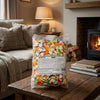 Bebeto Multi Coloured Hearts 2kg on a coffee table in a cosy home living room setting