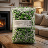 Krazy Kandi Chocolate Limes 3kg on a coffee table in a cosy home living room setting