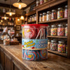Krazy Kandi Seaside Swirl Rock Pop Mixed Flavours Cherry Cola Bubblegum Hard Rock Lollipops 1500g on a coffee table in a cosy home living room setting