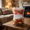 Bebeto Assorted Mix of Gummy Sweets 2kg on a coffee table in a cosy home living room setting