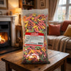 Bebeto Sour Neon Worms 2kg on a coffee table in a cosy home living room setting