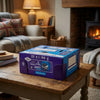 Cadburys Dairy Milk Oreo Sandwich 14 x 96g on a coffee table in a cosy home living room setting