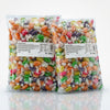 Two packs of Krazy Kandi Chocolate Fruits 3kg commercial marketing layout on a reflective white surface