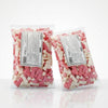 Two packs of Bebeto Jelly Bones 2kg commercial marketing layout on a reflective white surface