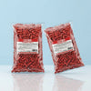Two packs of Bebeto Strawberry Pencil Bites 2kg commercial marketing layout on a reflective white surface