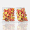Two packs of Aladdins Peach Rings 1kg commercial marketing layout on a reflective white surface